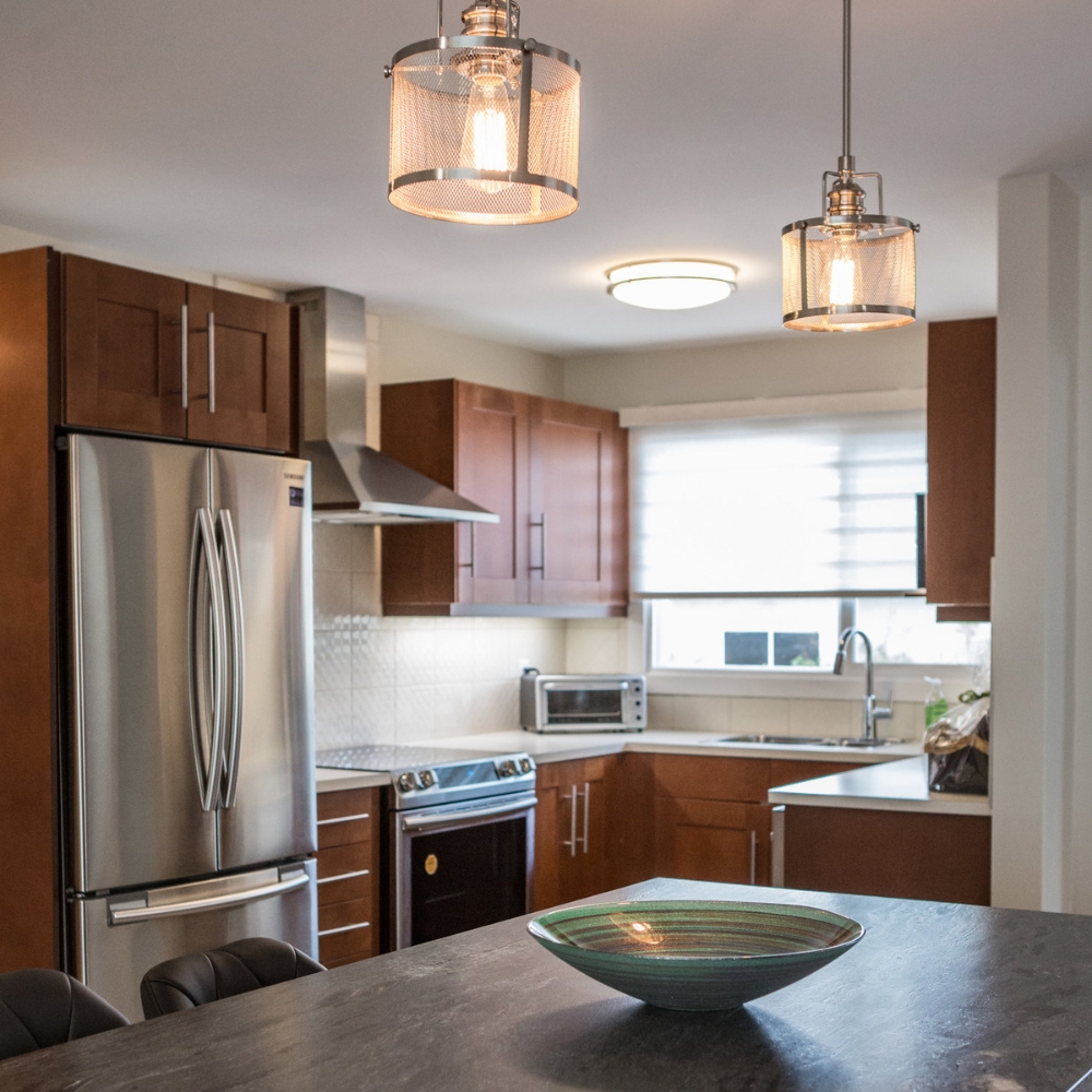 Kitchen renovation with pendant lighting above island