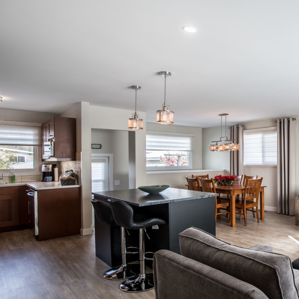 View on main floor renovation featuring living room, dining room & kitchen
